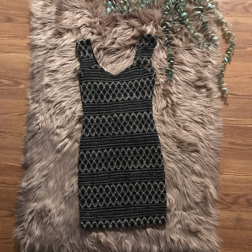 Black bodycon party dress with gold stitching